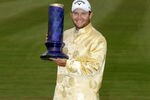 TIANJIN, CHINA - APRIL 22:  Branden Grace of South Africa with the winners trophy after the final round of the Volvo China Open at the Binhai Lake Golf Course on April 22, 2012 in Tianjin, China.  (Photo by Ross Kinnaird/Getty Images)
