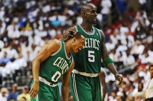 PHILADELPHIA, PA - MAY 18: Kevin Garnett #5 of the Boston Celtics comforts teammate Avery Bradley #0 as he winces in pain during the game against the Philadelphia 76ers in Game Four of the Eastern Conference Semifinals in the 2012 NBA Playoffs at the Wells Fargo Center on May 18, 2012 in Philadelphia, Pennsylvania. The Sixers won 92-83. NOTE TO USER: User expressly acknowledges and agrees that, by downloading and or using this photograph, User is consenting to the terms and conditions of the Getty Images License Agreement. (Photo by Drew Hallowell/Getty Images)