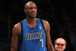 LOS ANGELES, CA - JANUARY 16: Lamar Odom #7 of the Dallas Mavericks gets an ovation from the crowd includin actor Jack Nicholson as he enters the game against the Los Angeles Lakers at Staples Center on January 16, 2012 in Los Angeles, California.  NOTE TO USER: User expressly acknowledges and agrees that, by downloading and or using this photograph, User is consenting to the terms and conditions of the Getty Images License Agreement.  (Photo by Stephen Dunn/Getty Images)