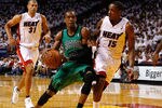 MIAMI, FL - MAY 28:  Rajon Rondo #9 of the Boston Celtics drives in the first half against Mario Chalmers #15 of the Miami Heat in Game One of the Eastern Conference Finals in the 2012 NBA Playoffs on May 28, 2012 at American Airlines Arena in Miami, Florida.  NOTE TO USER: User expressly acknowledges and agrees that, by downloading and or using this photograph, User is consenting to the terms and conditions of the Getty Images License Agreement.  (Photo by Mike Ehrmann/Getty Images)