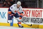 NEWARK, NJ - APRIL 03: John Tavares #91 of the New York Islanders skates against the New Jersey Devils at the Prudential Center on April 3, 2012 in Newark, New Jersey. The Devils defeated the Islanders 3-1.  (Photo by Bruce Bennett/Getty Images)