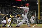 PITTSBURGH, PA - MAY 29:  Todd Frazier #21 of the Cincinnati Reds hits an RBI triple in the fourth inning against the Pittsburgh Pirates during the game on May 29, 2012 at PNC Park in Pittsburgh, Pennsylvania.  (Photo by Justin K. Aller/Getty Images)