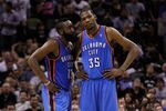 SAN ANTONIO, TX - MAY 29:  James Harden #13 talks with Kevin Durant #35 of the Oklahoma City Thunder in the fourth quarter while taking on the San Antonio Spurs in Game Two of the Western Conference Finals of the 2012 NBA Playoffs at AT&T Center on May 29, 2012 in San Antonio, Texas. NOTE TO USER: User expressly acknowledges and agrees that, by downloading and or using this photograph, user is consenting to the terms and conditions of the Getty Images License Agreement.  (Photo by Tom Pennington/Getty Images)