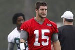 FLORHAM PARK, NJ - MAY 24:  Tim Tebow #15 of the New York Jets work out at an organized team activity at the New York Jets Atlantic Health Jets Training Center on May 24, 2012 in Florham Park, New Jersey.  (Photo by Jeff Zelevansky/Getty Images)