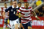 JACKSONVILLE, FL - MAY 26:  Jermaine Jones #13 of team USA beats Scott Brown #8 of Team Scotland to the ball on May 26, 2012 at EverBank Field in Jacksonville, Florida. (Photo by Gary Bogdon/Getty Images)