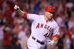 ANAHEIM, CA - MAY 28:  Mark Trumbo #44 of the Los Angeles Angels of Anaheim celebrates as he rounds first base after hitting a walk off home run in the ninth inning against the New York Yankees at Angel Stadium of Anaheim on May 28, 2012 in Anaheim, California. The Angels defeated the Yankees 9-8.  (Photo by Jeff Gross/Getty Images)