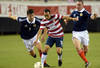 JACKSONVILLE, FL - MAY 26:  Landon Donovan #10 of Team USA , is defended by Charlie Mulgrew #3 and Scott Brown #8 of Team Scotland on May 26, 2012 at EverBank Field in Jacksonville, Florida. (Photo by Gary Bogdon/Getty Images)