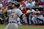 ARLINGTON, TX - OCTOBER 10:  Ryan Raburn #25 of the Detroit Tigers hits a three-run home run in the third inning of Game Two of the American League Championship Series against the Texas Rangers at Rangers Ballpark in Arlington on October 10, 2011 in Arlington, Texas.  (Photo by Kevork Djansezian/Getty Images)