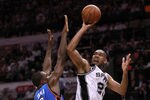 SAN ANTONIO, TX - MAY 29:  Tim Duncan #21 of the San Antonio Spurs goes up for a shot over Serge Ibaka #9 of the Oklahoma City Thunder in the fourth quarter in Game Two of the Western Conference Finals of the 2012 NBA Playoffs at AT&T Center on May 29, 2012 in San Antonio, Texas. NOTE TO USER: User expressly acknowledges and agrees that, by downloading and or using this photograph, user is consenting to the terms and conditions of the Getty Images License Agreement.  (Photo by Ronald Martinez/Getty Images)
