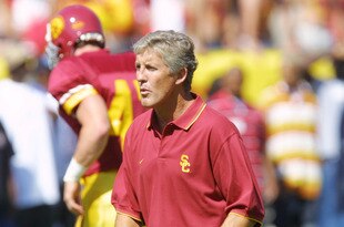 1 Sep 2001:  USC head coach Pete Carroll watches his team warm up for their game with San Jose State at the Los Angeles Coliseum in Los Angeles California. USC won 21-10. DIGITAL IMAGE.  Mandatory Credit:  Stephen Dunn/Allsport.