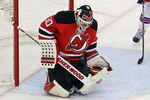 NEWARK, NJ - MAY 25: Martin Brodeur #30 of the New Jersey Devils makes a save against the New York Rangers  in Game Six of the Eastern Conference Final during the 2012 NHL Stanley Cup Playoffs at the Prudential Center on May 25, 2012 in Newark, New Jersey.  (Photo by Jim McIsaac/Getty Images)