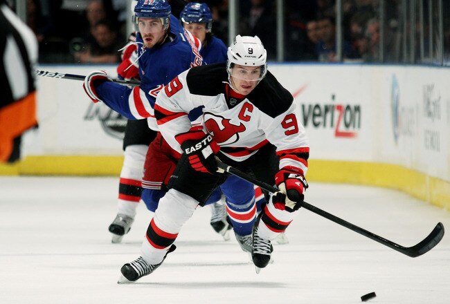 NEW YORK, NY - MAY 16:  Zach Parise #9 of the New Jersey Devils controls the puck in Game Two of the Eastern Conference Final against the New York Rangers during the 2012 NHL Stanley Cup Playoffs at Madison Square Garden on May 16, 2012 in New York City.  (Photo by Bruce Bennett/Getty Images)