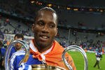 MUNICH, GERMANY - MAY 19:  Didier Drogba of Chelsea celebrates with the trophy after their victory in the UEFA Champions League Final between FC Bayern Muenchen and Chelsea at the Fussball Arena München on May 19, 2012 in Munich, Germany.  (Photo by Alex Livesey/Getty Images)