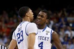 NEW ORLEANS, LA - APRIL 02:  Anthony Davis #23 and Michael Kidd-Gilchrist #14 of the Kentucky Wildcats react late in the second half while taking on the Kansas Jayhawks in the National Championship Game of the 2012 NCAA Division I Men's Basketball Tournament at the Mercedes-Benz Superdome on April 2, 2012 in New Orleans, Louisiana.  (Photo by Jeff Gross/Getty Images)