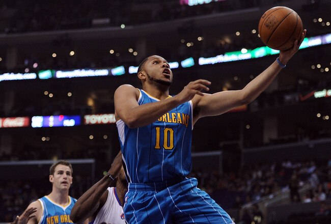 LOS ANGELES, CA - APRIL 22:  Eric Gordon #10 of the New Orleans Hornets scores on a layup against the Los Angeles Clippers at Staples Center on April 22, 2012 in Los Angeles, California.  NOTE TO USER: User expressly acknowledges and agrees that, by downloading and or using this photograph, User is consenting to the terms and conditions of the Getty Images License Agreement.  (Photo by Harry How/Getty Images)