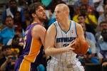 NEW ORLEANS, LA - MARCH 14:  Chris Kaman #35 of the New Orleans Hornets looks to drive the ball around Pau Gasol #16 of the Los Angeles Lakers at the New Orleans Arena on March 14, 2012 in New Orleans, Louisiana.  NOTE TO USER: User expressly acknowledges and agrees that, by downloading and or using this photograph, User is consenting to the terms and conditions of the Getty Images License Agreement.  (Photo by Chris Graythen/Getty Images)