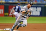 ST. PETERSBURG, FL - MAY 30:  Infielder Gordan Beckham #15  of the Chicago White Sox rounds third base in the first inning against the Tampa Bay Rays May 30, 2012  at Tropicana Field in St. Petersburg, Florida.  Beckham scored. (Photo by Al Messerschmidt/Getty Images)
