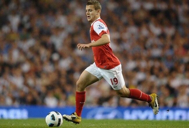 LONDON, ENGLAND - APRIL 20:  Jack Wilshere of Arsenal runs with the ball during the Barclays Premier League match between Tottenham Hotspur and Arsenal at White Hart Lane on April 20, 2011 in London, England.  (Photo by Laurence Griffiths/Getty Images)