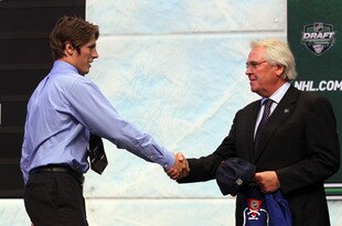 ST PAUL, MN - JUNE 24:  Fifteenth overall pick Jonathan Miller by the New York Rangers shakes hands with General Manager Glen Sather of the New York Rangers during day one of the 2011 NHL Entry Draft at Xcel Energy Center on June 24, 2011 in St Paul, Minnesota.  (Photo by Bruce Bennett/Getty Images)