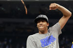 NEW ORLEANS, LA - APRIL 02:  Anthony Davis #23 of the Kentucky Wildcats celebrates before he cuts down the net after the Wildcats defeat the Kansas Jayhawks 67-59 in the National Championship Game of the 2012 NCAA Division I Men's Basketball Tournament at the Mercedes-Benz Superdome on April 2, 2012 in New Orleans, Louisiana.  (Photo by Ronald Martinez/Getty Images)