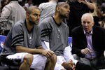 SAN ANTONIO, TX - MAY 29:  (R-L) Head coach Gregg Popovich of the San Antonio Spurs talks to Tim Duncan #21 and Tony Parker #9 on the bench in the third quarter while taking on the Oklahoma City Thunder in Game Two of the Western Conference Finals of the 2012 NBA Playoffs at AT&T Center on May 29, 2012 in San Antonio, Texas. NOTE TO USER: User expressly acknowledges and agrees that, by downloading and or using this photograph, user is consenting to the terms and conditions of the Getty Images License Agreement.  (Photo by Tom Pennington/Getty Images)