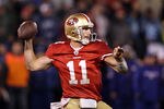 SAN FRANCISCO, CA - JANUARY 22:  Alex Smith #11 of the San Francisco 49ers throws a pass against the New York Giants during the NFC Championship Game at Candlestick Park on January 22, 2012 in San Francisco, California.  (Photo by Ezra Shaw/Getty Images)