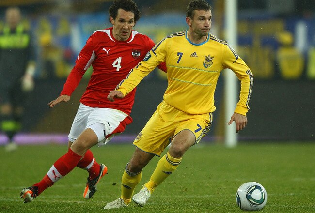 L'VIV, UKRAINE - NOVEMBER 15:  Andriy Shevchenko of Ukraine holds off Emanuel Pogatetz of Austria during the International Friendly match between Ukraine and Austria at the Lviv Arena on November 15, 2011 in L'viv, Ukraine.  (Photo by Richard Heathcote/Getty Images)