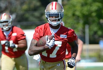 SANTA CLARA, CA - MAY 11:  A.J. Jenkins #17 of the San Francisco 49ers catches a pass and runs up field during Rookie Minincamp at the San Francisco 49ers practice facility on May 11, 2012 in Santa Clara, California.  (Photo by Thearon W. Henderson/Getty Images)