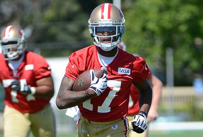 SANTA CLARA, CA - MAY 11:  A.J. Jenkins #17 of the San Francisco 49ers catches a pass and runs up field during Rookie Minincamp at the San Francisco 49ers practice facility on May 11, 2012 in Santa Clara, California.  (Photo by Thearon W. Henderson/Getty Images)