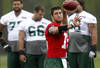 FLORHAM PARK, NJ - MAY 24:  Tim Tebow #15 of the New York Jets work out at an organized team activity at the New York Jets Atlantic Health Jets Training Center on May 24, 2012 in Florham Park, New Jersey.  (Photo by Jeff Zelevansky/Getty Images)