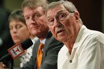 AUSTIN, TX - JUNE 15:  University of Texas at Austin Men's Athletics Director DeLoss Dodds, right, University President William Powers Jr., center, and Women's Athletics Director Chris Plonskon announce the athletics programs will continue competing in the Big 12 Conference June 15, 2010 in Austin, Texas.  (Photo by Erich Schlegel/Getty Images)