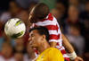 LANDOVER, MD - MAY 30: Leandro Damiao #9 of Brazil and Oguchi Onyewu #5 of USA head the ball during an International friendly game at FedExField on May 30, 2012 in Landover, Maryland.  (Photo by Rob Carr/Getty Images)
