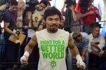 HOLLYWOOD, CA - MAY 30:  Manny Pacquiao warms up before his workout in preparation for his fight against Timothy Bradley at the Wild Card Boxing Club on May 30, 2012 in Hollywood, California.  (Photo by Harry How/Getty Images)