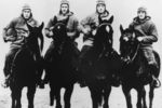 The Four Horsemen of Notre Dame, (L-R) quarterback Harry Stuhldreher, fullback Elmer Leyden, left halfback Jim Crowley, and right hafback Don Miller. George Strickler, Knute Rockne's student publicity aide posed the four players, dressed in their uniforms, on the backs of four horses from a livery stable in town. (Photo by Notre Dame University/Getty Images) *** Local Caption ***