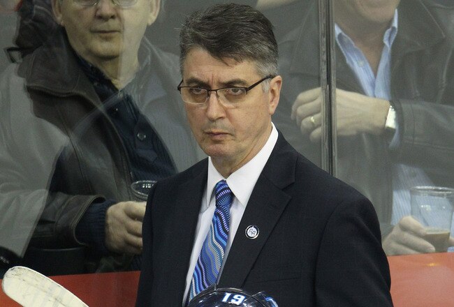 WINNIPEG, CANADA - FEBRUARY 19: Head Coach Claude Noel and Jim Slater #19 of the Winnipeg Jets look on from the bench during their NHL game against the Colorado Avalanche at MTS Centre on February 19, 2012 in Winnipeg, Manitoba, Canada. (Photo by Tom Szczerbowski/Getty Images)