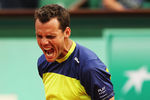 PARIS, FRANCE - MAY 31:  Paul-Henri Mathieu of France celebrates a point in his men's singles second round match against John Isner of USA during day 5 of the French Open at Roland Garros on May 31, 2012 in Paris, France.  (Photo by Matthew Stockman/Getty Images)