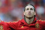 BERN, SWITZERLAND - MAY 30: Fernando Torres (L) of Spain stands with his teammate Sergio Ramos as they listen to their countries national anthem during the international friendly match between Spain and Korea Republic on May 30, 2012 in Bern, Switzerland.  (Photo by Jasper Juinen/Getty Images)