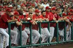 ANAHEIM, CA - MAY 29:  The Los Angeles Angels watch play during the first inning against the New York Yankees at Angel Stadium of Anaheim on May 29, 2012 in Anaheim, California.  (Photo by Harry How/Getty Images)
