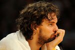 LOS ANGELES, CA - MAY 06:  Pau Gasol #16 of the Los Angeles Lakers looks on from the bench in the first half against the Houston Rockets in Game Two of the Western Conference Semifinals during the 2009 NBA Playoffs at Staples Center on May 6, 2009 in Los Angeles, California. NOTE TO USER: User expressly acknowledges and agrees that, by downloading and or using this photograph, User is consenting to the terms and conditions of the Getty Images License Agreement.  (Photo by Harry How/Getty Images)