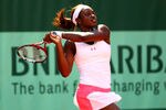 PARIS, FRANCE - MAY 28:  Sloane Stephens of USA plays a backhand in the women's singles first round match between Ekaterina Makarova of Russia and Sloane Stephens of USA during day two of the French Open at Roland Garros on May 28, 2012 in Paris, France.  (Photo by Clive Brunskill/Getty Images)