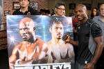 LOS ANGELES, CA - MAY 29:  Timothy Bradley stands in front of a placard advertising Bradley Paquiao 2, which would happen if he wins their upcoming fight in June, at a media workout  at Fortune Gym on May 29, 2012 in Los Angeles, California.  The workout is in advance of Bradley's upcoming WBO welterweight championship fight against Manny Pacquiao on June 9 at the MGM Grand in Las Vegas.  (Photo by Stephen Dunn/Getty Images)