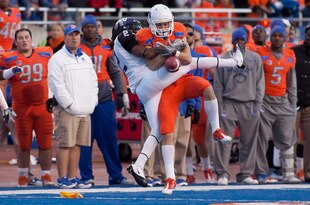 BOISE, ID - NOVEMBER 12: Matt Miller #2 of the Boise State Broncos fails to come up with the ball against Jason Verrett #2 of the TCU Horned Frogs at Bronco Stadium on November 12, 2011 in Boise, Idaho.  Verrett was called for holding. (Photo by Otto Kitsinger III/Getty Images)