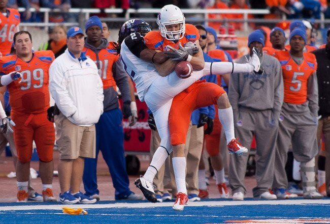 BOISE, ID - NOVEMBER 12: Matt Miller #2 of the Boise State Broncos fails to come up with the ball against Jason Verrett #2 of the TCU Horned Frogs at Bronco Stadium on November 12, 2011 in Boise, Idaho.  Verrett was called for holding. (Photo by Otto Kitsinger III/Getty Images)