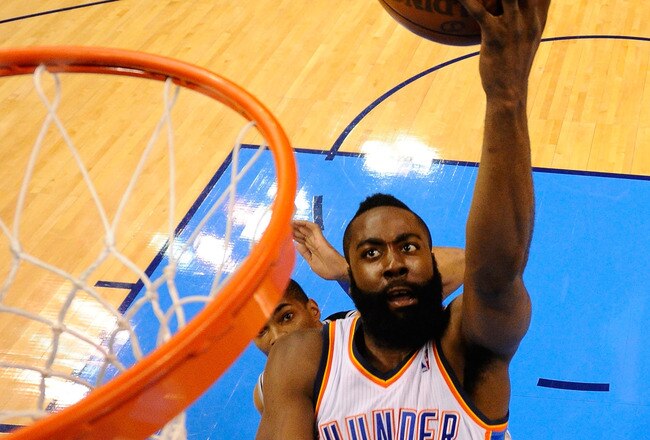 OKLAHOMA CITY, OK - MAY 31:  James Harden #13 of the Oklahoma City Thunder lays the ball up against the San Antonio Spurs in Game Five of the Western Conference Finals of the 2012 NBA Playoffs at Chesapeake Energy Arena on May 31, 2012 in Oklahoma City, Oklahoma. NOTE TO USER: User expressly acknowledges and agrees that, by downloading and or using this photograph, User is consenting to the terms and conditions of the Getty Images License Agreement.  (Photo by Ronald Martinez/Getty Images)