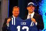 NEW YORK, NY - APRIL 26:  Andrew Luck (R) from Stanford holds up a jersey as he stands on stage with NFL Commissioner Roger Goodell after Luck was selected #1 overall by the Indianapolis Colts in the first round of the 2012 NFL Draft at Radio City Music Hall on April 26, 2012 in New York City.  (Photo by Al Bello/Getty Images)