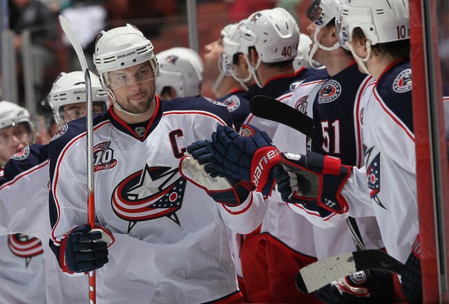 ANAHEIM, CA - NOVEMBER 19:  Rick Nash #61 of the Columbus Blue Jackets receives high fives from the bench after scoring a goal against the Anaheim Ducks in the first period at the Honda Center on November 19, 2010 in Anaheim, California.  (Photo by Jeff Gross/Getty Images)