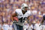 SEATTLE - SEPTEMBER 6:  Harvey Unga #45 of the BYU Cougars runs with the ball during their game against the Washington Huskies on September 6, 2008 at Husky Stadium in Seattle, Washington. The Cougars defeated the Huskies 28-27. (Photo by Otto Greule Jr/Getty Images)