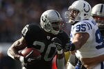 OAKLAND, CA - DECEMBER 26:  Darren McFadden #20 of the Oakland Raiders runs against Fili Moala #95 of the Indianapolis Colts during an NFL game at Oakland-Alameda County Coliseum on December  26, 2010 in Oakland, California.  (Photo by Jed Jacobsohn/Getty Images)
