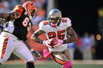 CINCINNATI, OH - OCTOBER 10: Aqib Talib #25 of the Tampa Bay Buccaneers returns an interception against the Cincinnati Bengals at Paul Brown Stadium on October 10, 2010 in Cincinnati, Ohio. (Photo by Jamie Sabau/Getty Images)