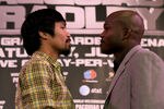 BEVERLY HILLS, CA - FEBRUARY 21:  Manny Pacquiao (L) and Timothy Bradley pose for photographers at a press conference announcing their upcoming World Boxing Organization welterweight championship fight at The Beverly Hills Hotel on February 21, 2012 in Beverly Hills, California.  (Photo by Stephen Dunn/Getty Images)
